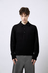 Polo aus Merino-Bouclé-Wolle