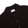 Polo aus Merino-Bouclé-Wolle