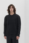 Brushed crew neck in buttoned Merino wool