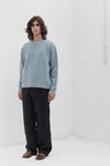 Brushed crew neck in buttoned Merino wool
