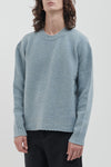 Brushed crew neck in buttoned Merino wool