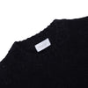 Brushed crew neck in buttoned Merino wool