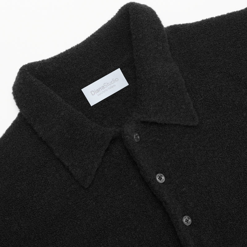 Polo aus Merino-Bouclé-Wolle