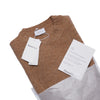 Brushed crew neck in buttoned Merino wool