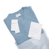 Brushed crew neck in buttoned Merino wool