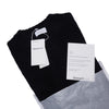 Brushed crew neck in buttoned Merino wool